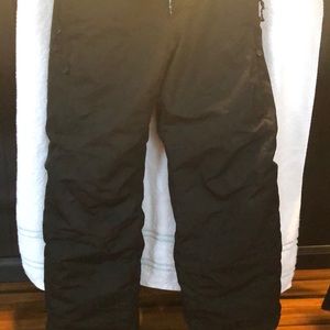 Young girls dragonflies snow pants.